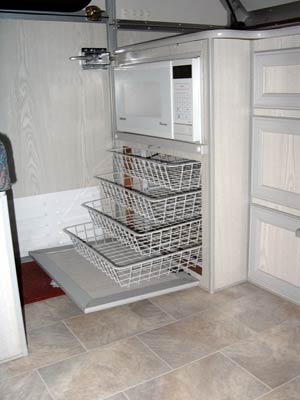 Wire baskets in cupboard